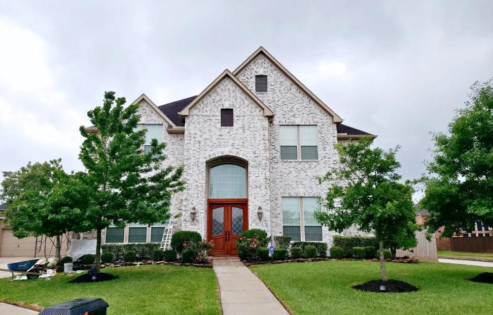 German smear finish on a League City brick home